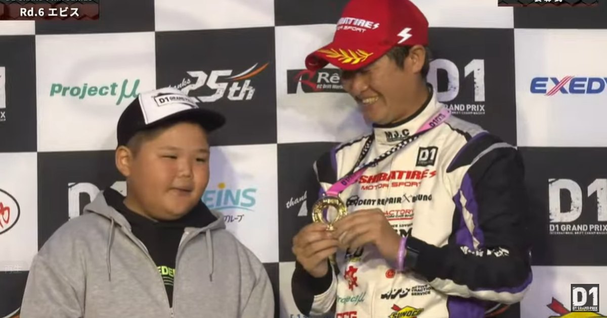 Masashi Yokoi holds his winner's medal at the D1 Grand Prix 2026 Rd.6 podium ceremony at Ebisu Circuit, from D1's official results page
