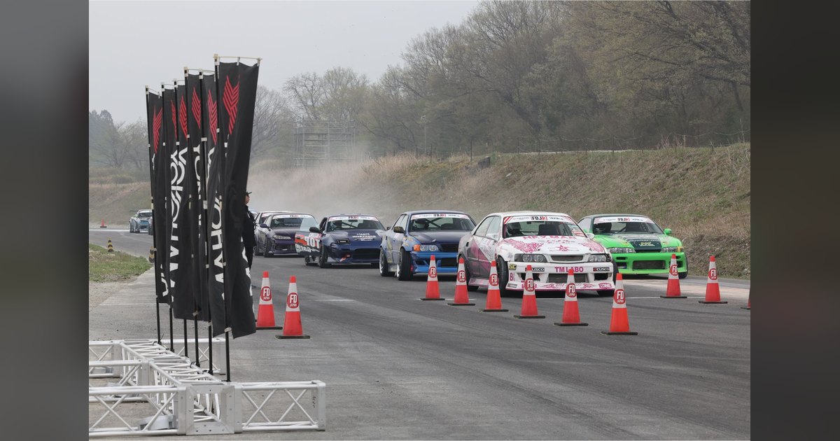 Photo from the official FDJ3 2026 Round 6 event page: Formula Drift Japan cars queued on track behind FD-branded cones