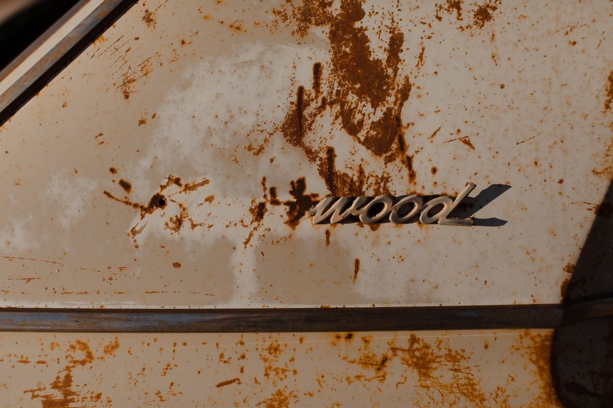 Surface rust spreading across an old car panel